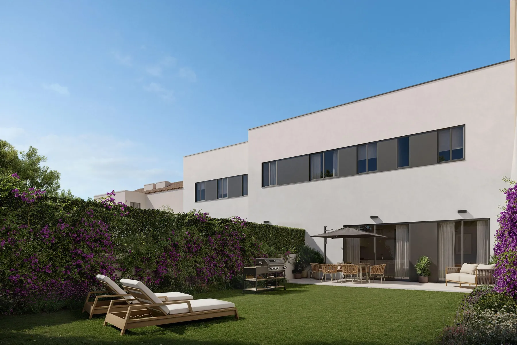 Casas adosadas blancas con jardín privado y buganvilla: imagen de proyecto de Jardines de Coello, en Barcelona